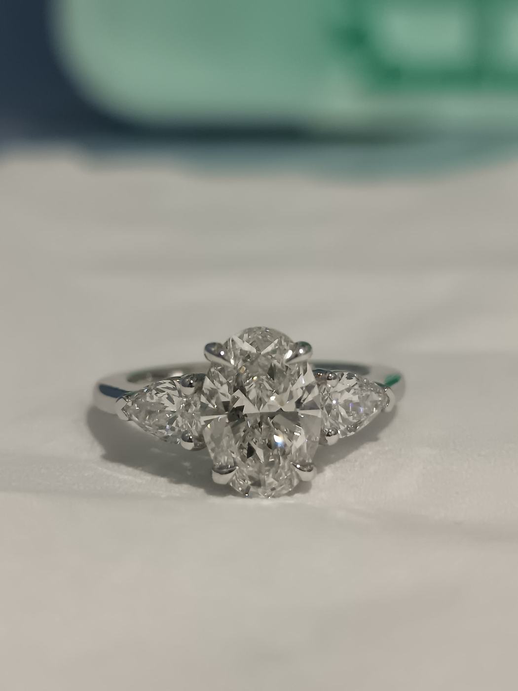 Oval three-stone diamond ring