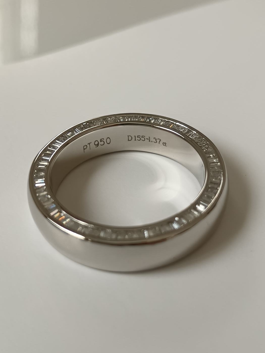 Platinum band with channel-set baguette diamonds